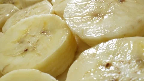 Close-up showcases a sliced ​​bananas. Stock Footage 276690499