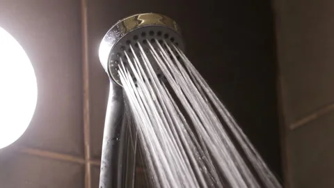 Close up of shower head, water is turned on Stock Footage 148380685