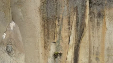 Close up showing the abstract patterns in brown and grey of a cliff Stock Footage 142755232