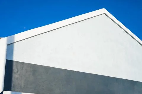 Close-up showing a clean geometric pattern formed by a single white gabled .. Stock Photos