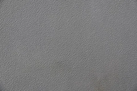 Close-up shows a textured gray surface 스톡 사진