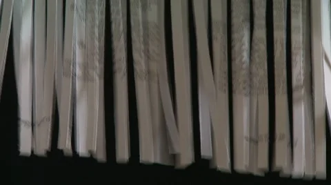 Close up of shredded paper ejected from paper shredder Stock-Footage 8839348