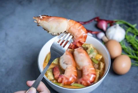 Close-up of a shrimp on a fork Stock Photos