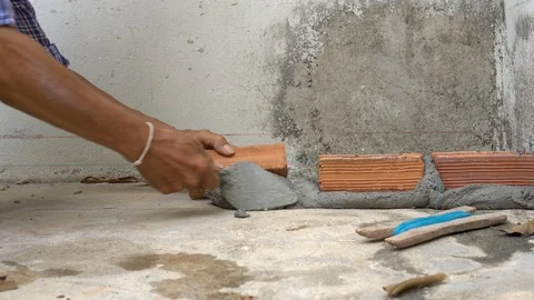 Close-up shut of Bricklayer working Stock Footage 113026462