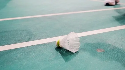 Close up shuttlecocks on racket badminton at badminton courts Stock Footage 100264545