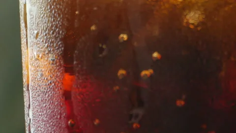 Close up on a the side of a cold beer bottle or soda bottle Stock Footage 153652725