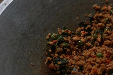A close up of a side dish with stir-fried leunca and oncom Stock Photos
