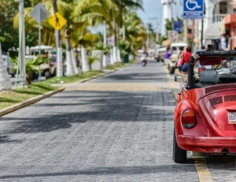 Close up side of parked red cabrio car Stock Photos