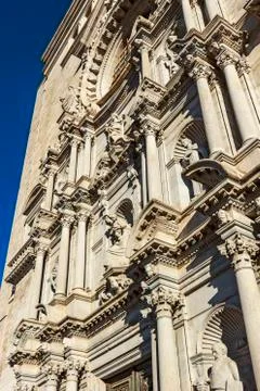 Close-up side perspective of the facade of Girona Cathedral. Stock Photos