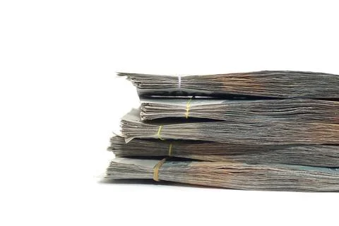 Close-up side perspective of stacks of rubber-banded Indonesian rupiah bank.. Stock Photos
