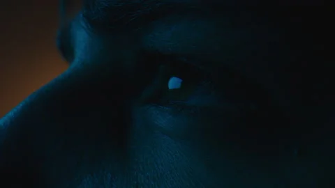 Close Up Side Profile of Man with Colourful Lights Stock Footage 154147171