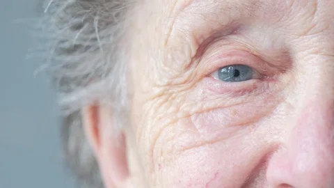 Close up side profile portrait of a senior woman Stock Footage 85523475