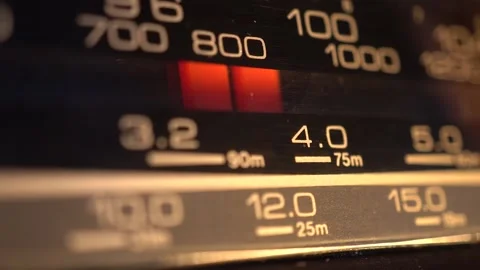 Close-up side selective focus macro view of retro radio tuning dial. Movement Video stock 170876400