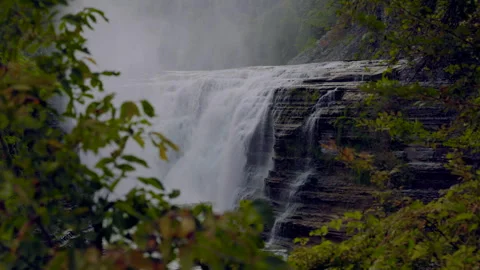 Close Up Side of Upper Falls in Letchworth State Park Frame Leaves Slow Motion Stock Footage 241042372