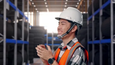 Close Up Side View Of Asian Male Engineer Smiling And Clapping His Hands Tire Stock Footage 341787252