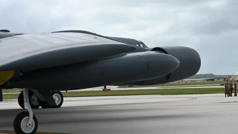 Close up side view of B-52 Bomber aircraft taxiing on flightline Stock Footage 263886954