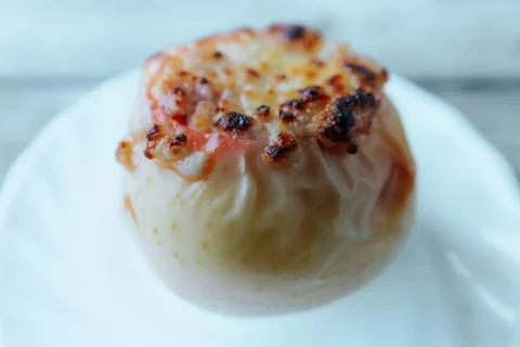 Close-up side view of a baked apple stuffed with. Stock Photos