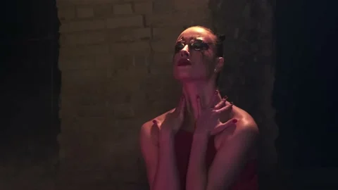 Close-up side view of beautiful dancing actress with stage makeup of silver Stock Footage 229669883