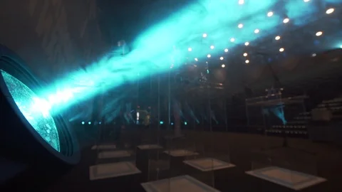 Close side view of blue cinema spotlight and dust floating in the air Vídeo Stock 121303371