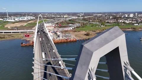 Close side view of bridge tower with urban background Video stock 331201052