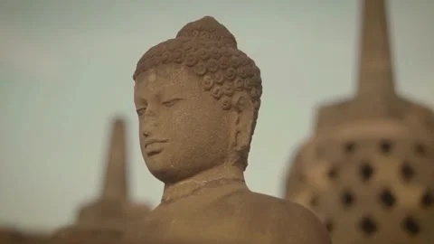 Close Up Side View of Buddha Statue at Borobudur Temple 動画素材 338275256