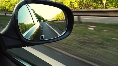 Close-up of the side view car mirror Stock Footage 137423729