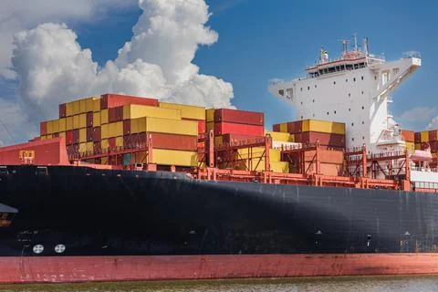 Close up side view of cargo ship at the sea Stock Photos