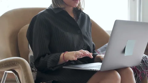 Close-up Side view concentrated young businesswoman working on computer Stock Footage 130870774