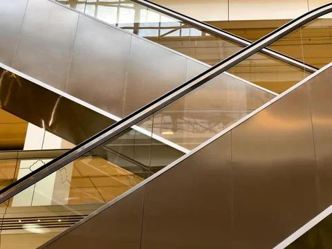 Close-up side view of escalator. Close-up of escalator and handrail Stock Photos