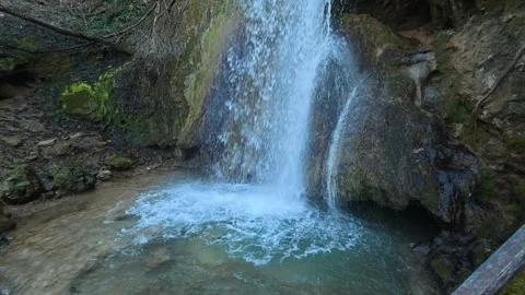 Close Side View of Forest Waterfall from Bottom to Top Slow Camera Move Video stock 330551742