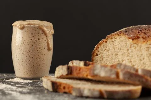 Close up side view image of a freshly baked thick crust sourdough artisan bread Stock Photos
