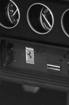 Close-up of Side view mirror and Logo Ferrari Sports Car. Ferrari is Italia.. Foto stock