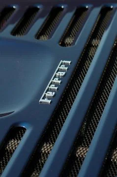 Close-up of Side view mirror and Logo Ferrari Sports Car. Ferrari is Italia.. Stock Photos