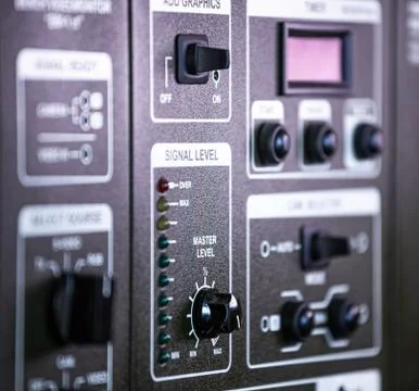 Close-up side view of panel of buttons and twirls Foto stock