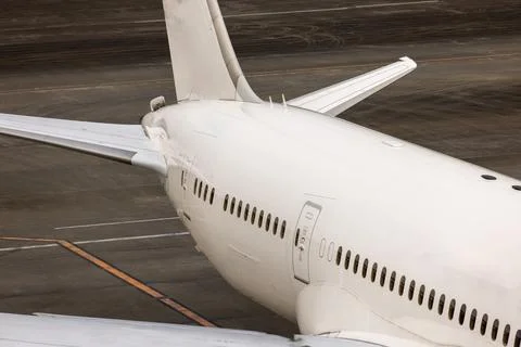 Close-Up Side View of a Passenger Airplane Stock Photos