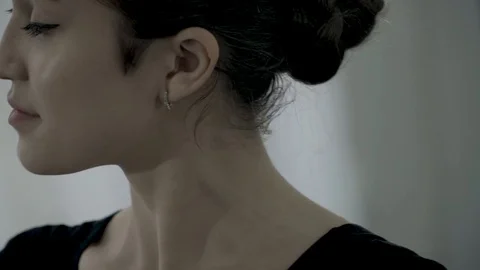 Close side view pretty Ballerina neck. Ballerina turn of her face amd make Video stock 113530135