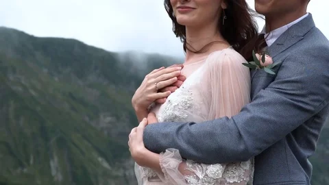 Close side view of romantic hugs. Video stock 101977325