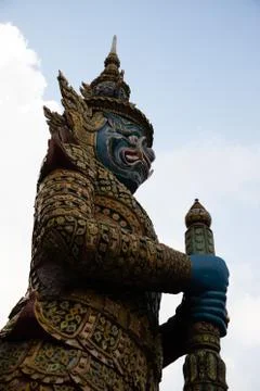 Close side view of a statue of the Emerald temple at Bangkok Stock Photos