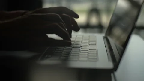 Close-up side view of unrecognizable male programmer freelancer working typing Stock-Footage 227185341