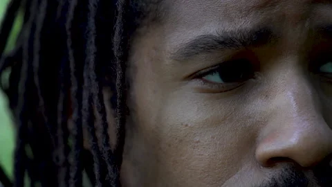 Close Up Side of Young Black Man's Face Stock Footage 142014502