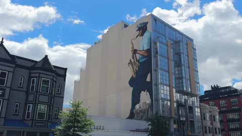 Close-up of sidewalk planter and utility meters Stock Footage 324600481