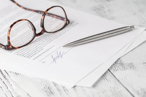 Close-up of signing a contract Stock Photos