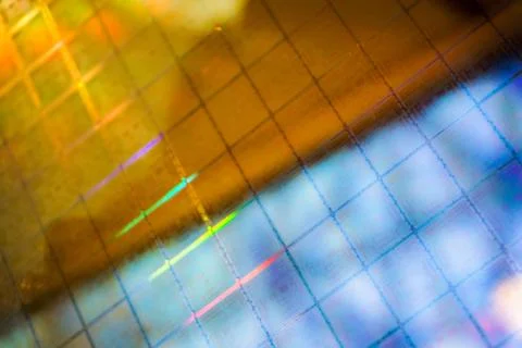 Close up of a silicon wafer of SIM computer chips. Foto stock