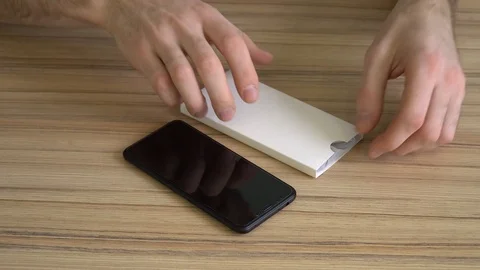 Close-up. Silicone case and new mobile phone. Stock Footage 86819482