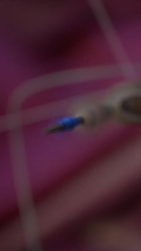 Close up of silk thread spool spinning on traditional bobbin winding mechanism Stock Footage 322576114