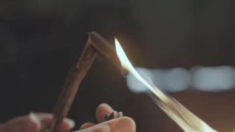 Close-up of Silver Artisan Lighting a Blowtorch with a Lighter in Workshop Video stock 333734137
