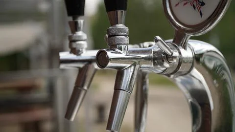 Close-Up of Silver Beer Taps from a Different Angle Stock Photos