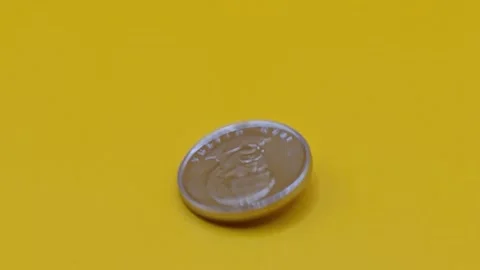 Close-up of a silver coin Stock Footage 333925850