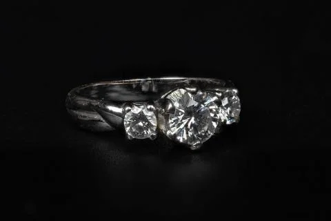 Close-up Silver Diamond Ring Isolated on Black Background Stock Photos