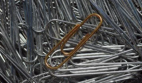 Close up of silver paper clips texture Stock Photos